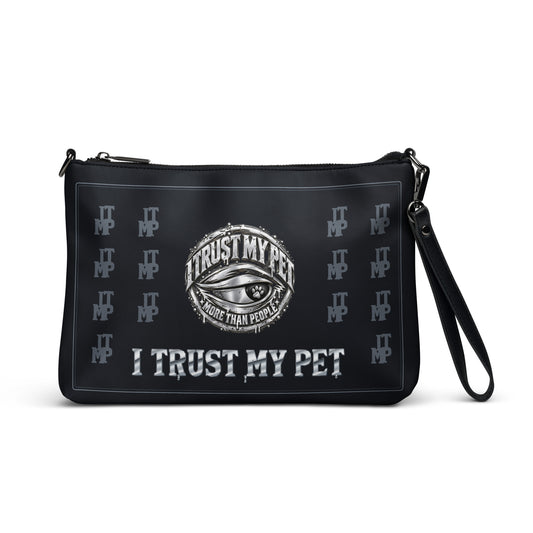 Black I Trust My Pet™ Silver Signature Crossbody Bag with black stitching, flat front view showing the complete original silver-look eye crest, charcoal monograms and custom brand lettering