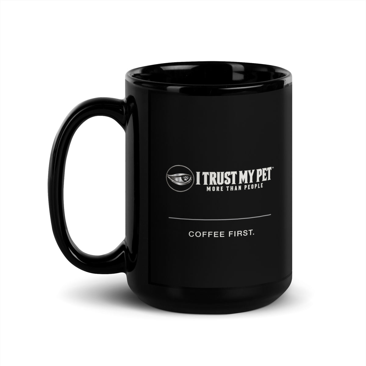 I Trust My Pet™ Coffee First black ceramic mug, 15 oz, with the complete logo and “Coffee first.” artwork, handle on left.