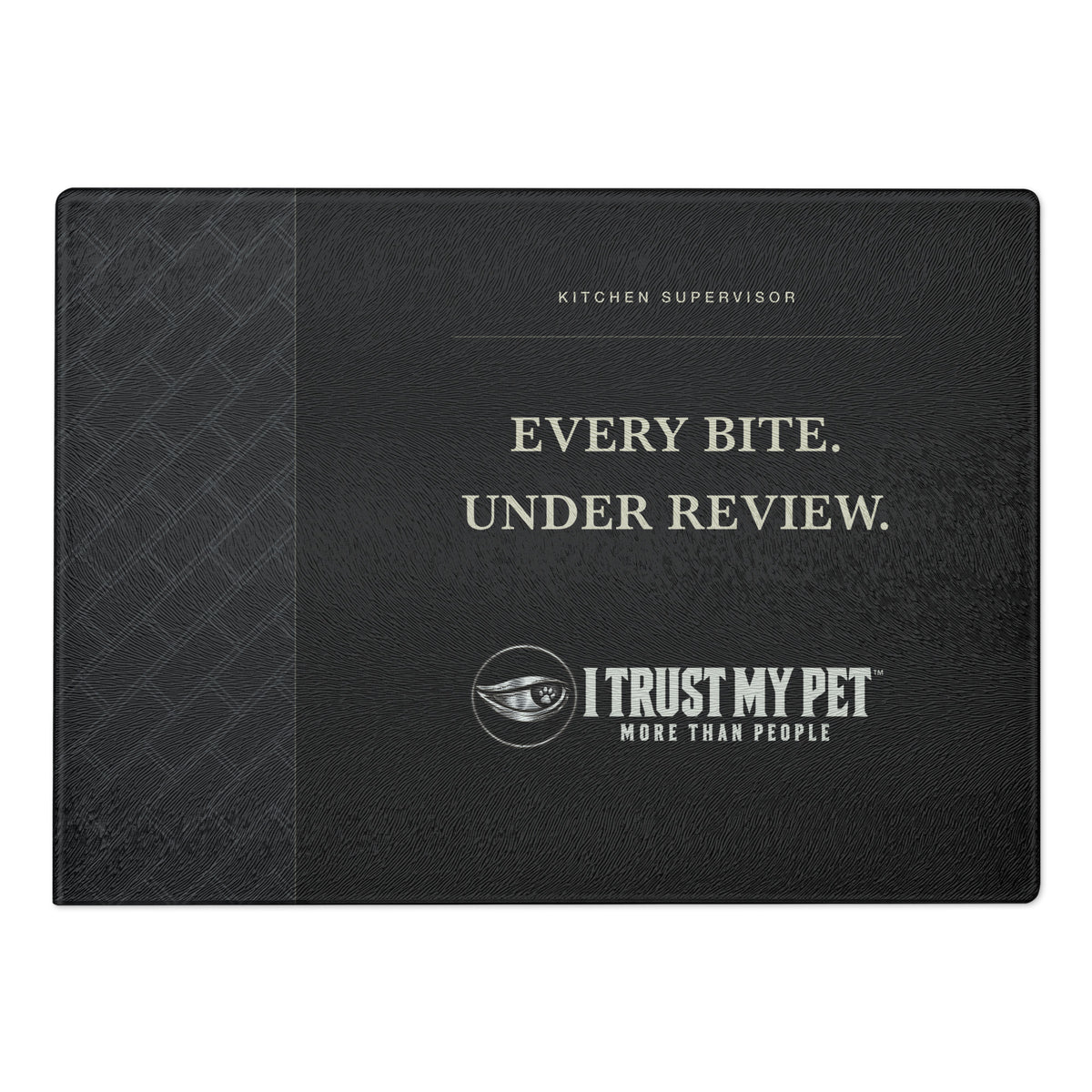 I Trust My Pet™ Kitchen Supervisor black glass cutting board, 11 × 15 inches, with charcoal linework, cream lettering and the full brand logo.