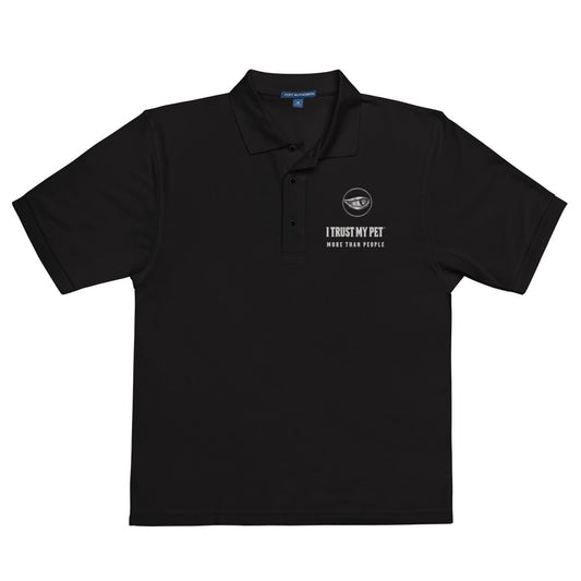 Black Quiet Authority men’s polo laid flat, with the I Trust My Pet™ eye-and-paw, name and More than people embroidered chest badge.
