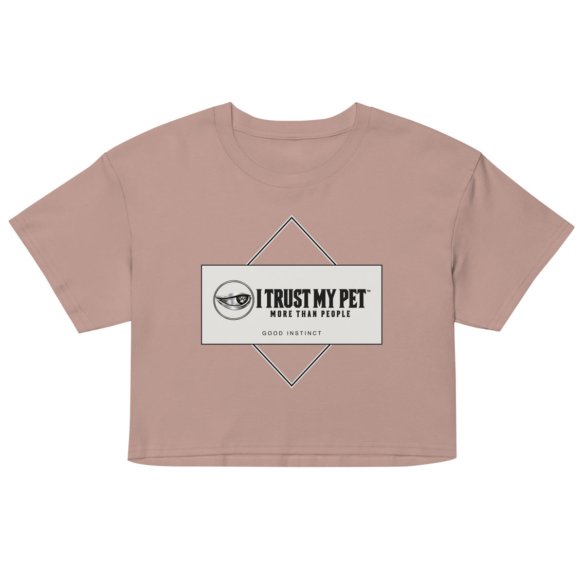 Hazy pink Good Instinct cotton crop tee, front with complete I Trust My Pet™ logo and geometric stone panel, garment-only view.