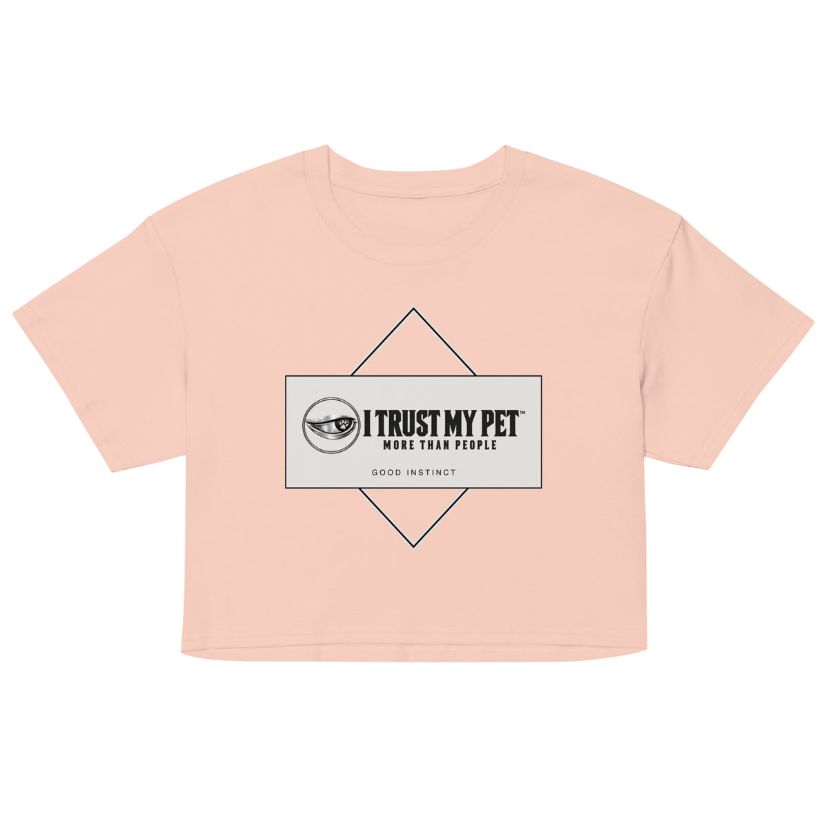 Pale pink Good Instinct cotton crop tee, front with complete I Trust My Pet™ logo and geometric stone panel, garment-only view.