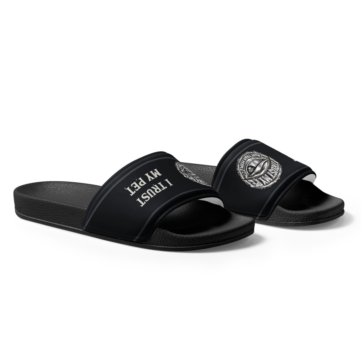 Angled front-right view of black I Trust My Pet™ Signature Crest slides with matte lettering
