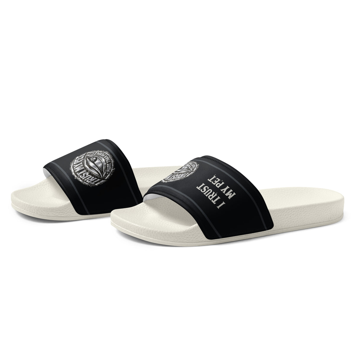 Angled front-left view of I Trust My Pet™ slides with white soles and black printed crest straps
