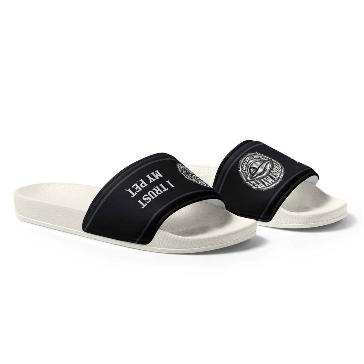 Angled front-right view of white-soled I Trust My Pet™ slides with matte lettering on black straps